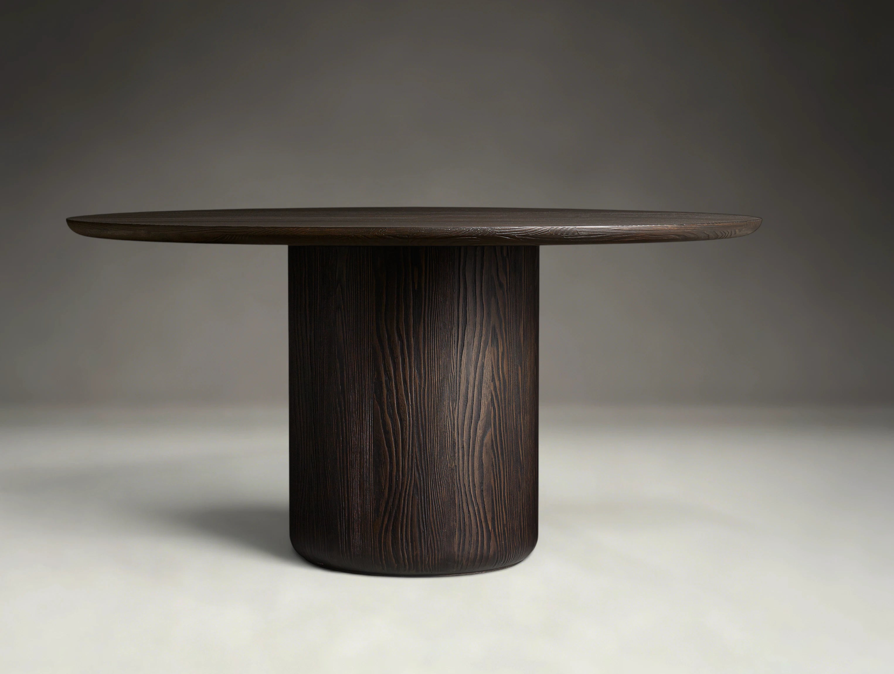 Arvello Pedestal Round Dining Table