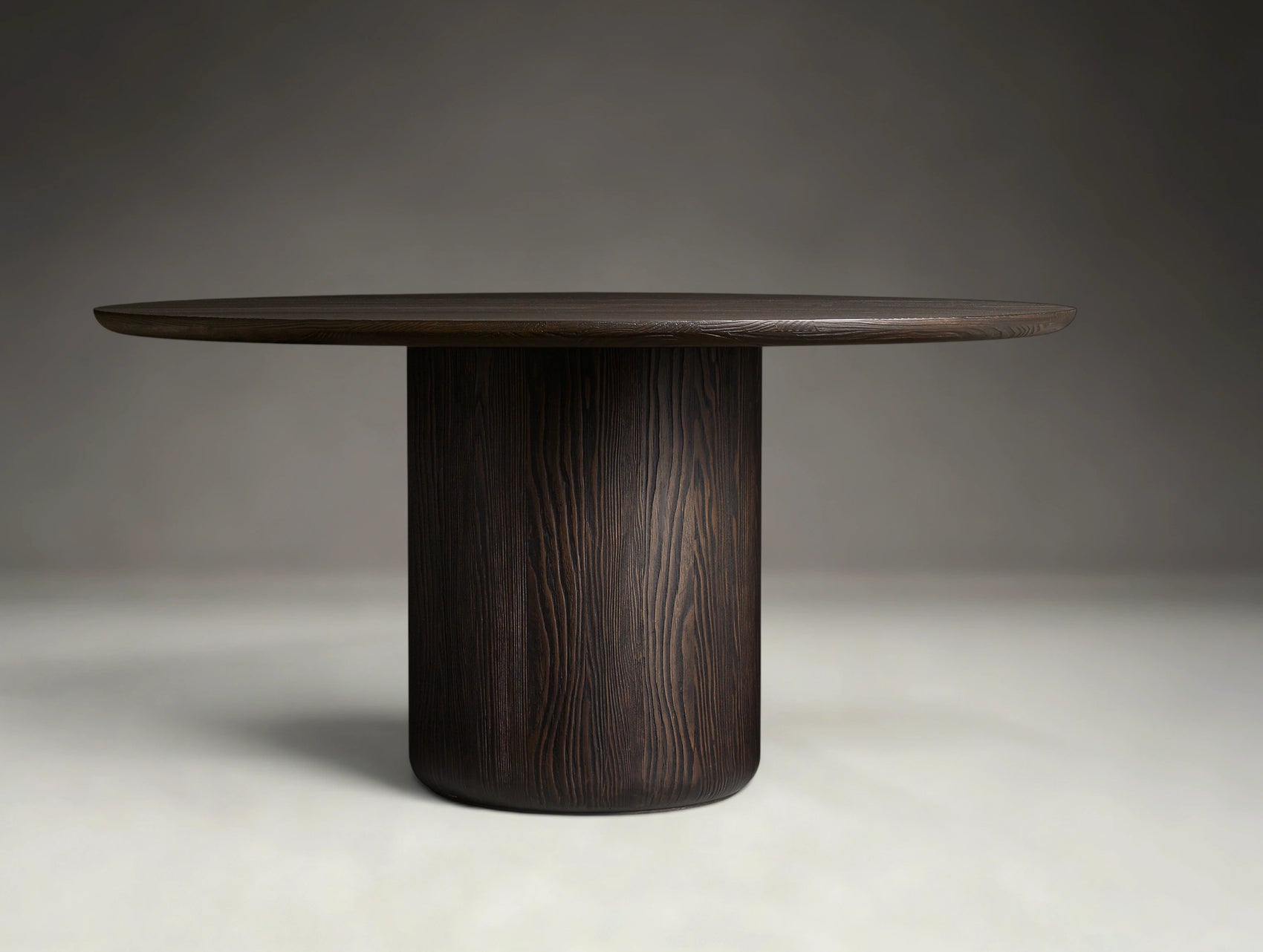 Arvello Pedestal Round Dining Table